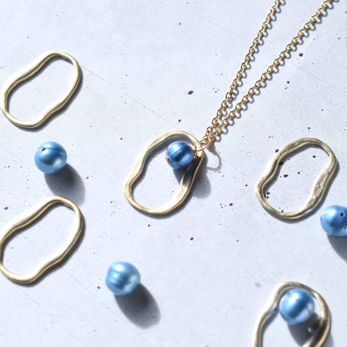 画像1: 新作入荷【数量限定・12点】ブルー淡水パール　オーバルリング　サージカルステンレスロングネックレス60cm  (1)